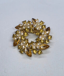 Brooch with gold crystals ring