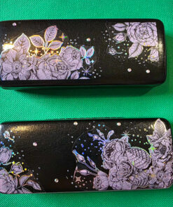 Black glasses with pink roses