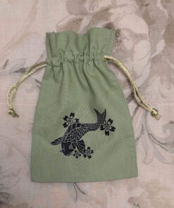 Green cotton bag with lucky charm 11,5 x 17 cm