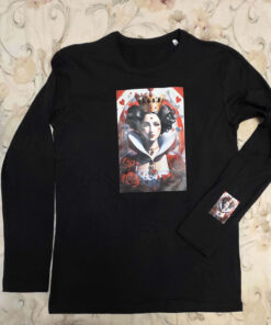 Black blouse with long sleeves and a strawberry emoji hem
