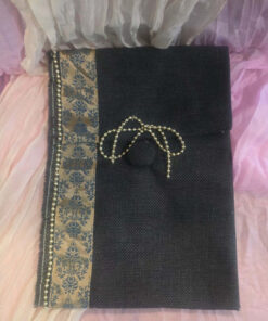 Black jute bag with baroque ribbon and golden beads