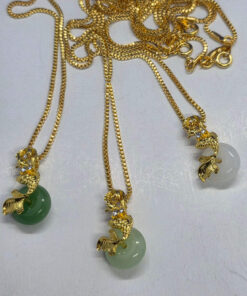 Kuldsete karpkaladega kaelaripats ketiga