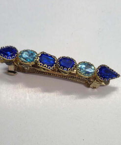 Siniste kristallidega kuldne juukseklamber