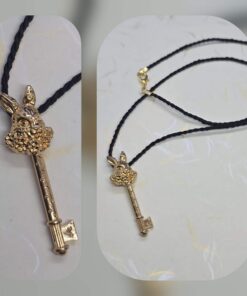 Alice Imedemaal jänes kuldne võtmega kaelaripats nööriga